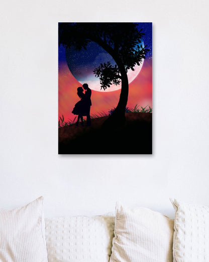 silhouette of a romantic couple under a tree with a view of  the earth - @elzart